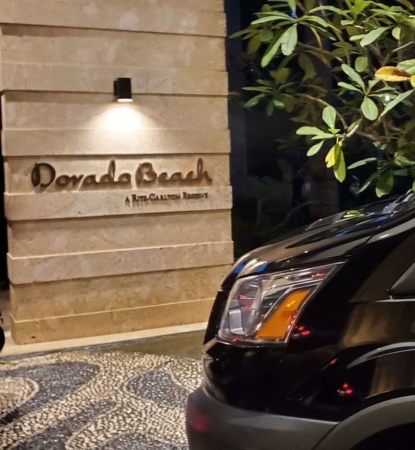 The private van at the entrance of Dorado Beach, a Ritz-Carlton Reserve, at night